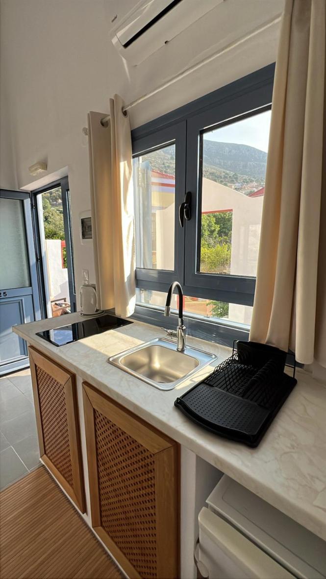 Taxiarchis Aparthotel Symi Bagian luar foto